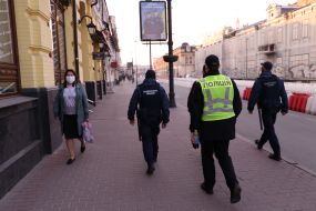 Police and municipal guard patrol the streets