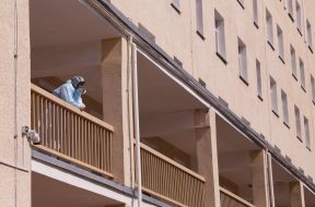 Health worker on the balcony of the infectious Department of the hospital