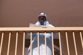 Health worker on the balcony of the infectious Department of the hospital