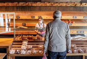 Shoppers at a bread shop