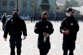 Law enforcement officers patrol the streets