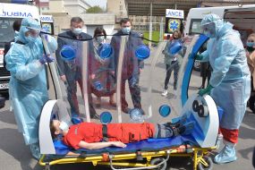 Conventionally, doctors put the sick female in the box for transporting infectious patients