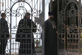 Priest in a medical mask