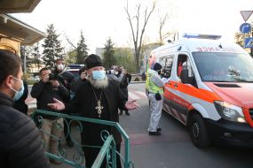 A priest near an ambulance