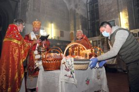 Easter baskets near priests