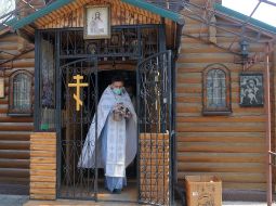 Priest in medical mask