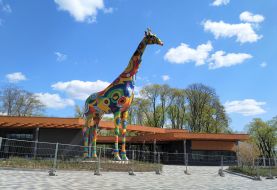 Giraffe sculpture near new zoo entrance
