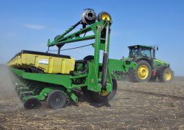 Tractor sowing sunflower seeds