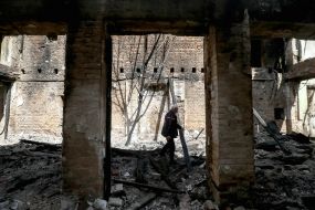 Man at the fire in the town of woodlands in the exclusion zone