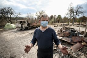 Resident at the hearth in the village of Ostrovy in Zhytomyr region