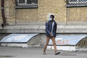 The guy in the mask goes near the hostel