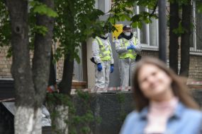 Law enforcement officers near the hostel