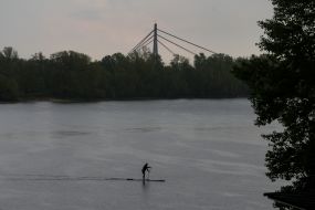 An athlete floats on a blackboard in the rain