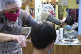 The Barber cuts the guy