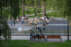 People walk in Natalka Park