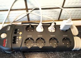 Plugs from electrical appliances are connected to the extension cord