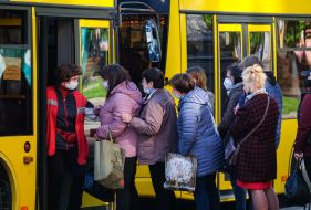 People get on the bus