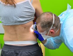 The doctor examines the patient