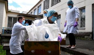 Doctors carry packages