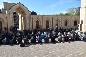 Muslims during a solemn prayer on the occasion of Ramadan Bairam