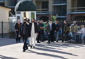 Muslims near the Ar-Rahma Mosque
