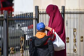 Muslims near the Ar-Rahma Mosque