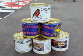 "Kremlin canned food" during the #StopRevenge action on Freedom Square in Kharkiv