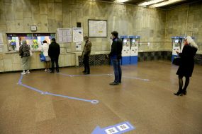 Passengers in line at the box office