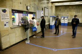 Passengers in line at the box office