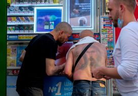 Men at the street kiosk