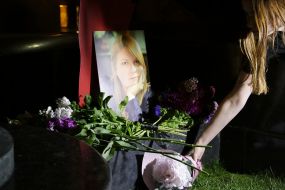 Flowers near the photo of Kateryna Gandziuk