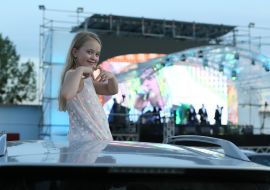 Girl in a car during the Picardy Third concert