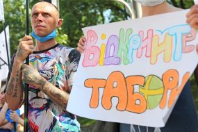 Poster with the words "Open camps"