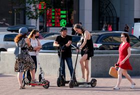 People with electric scooters