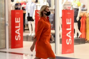 Woman in a medical mask in Lavina Mall in Kiev