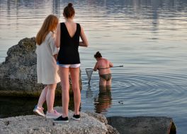 People rest by the sea in the Black Sea