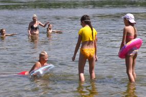 Children rest by the river in Zaporozhye