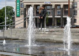 The guy with the girl near the fountain on Independence Square