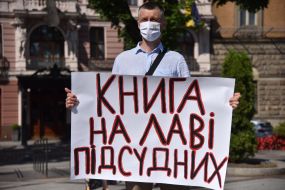 Action "Take your hands off Stus!"