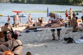 People rest on the beach