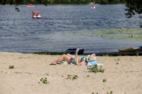 Woman sunbathing on the beach