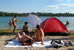 People rest on the beach