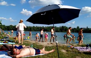 People rest on the beach