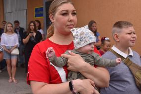 Woman holding a baby in her arms