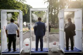 Participants of the All-Ukrainian Congress of the political party "For the Future" go through the disinfection framework