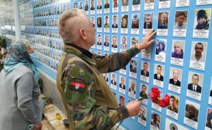 People near the Wall of Remembrance