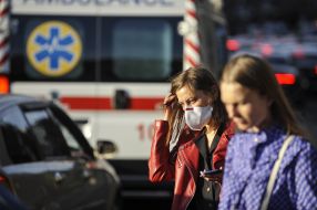 Girl in a respiratory mask in Kiev