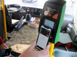 The passenger pays for travel by contactless bank card