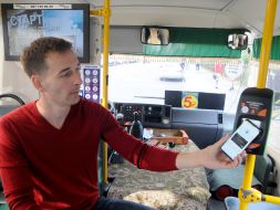The passenger pays for travel by contactless bank card