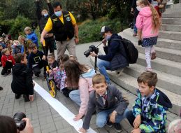 Setting a record for the longest greeting to teachers, written on sheets of notebooks